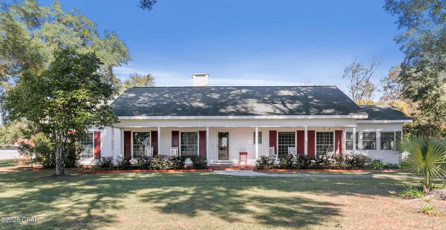 Welcome to your private, eco-smart oasis in Graceville, a beautifully updated 3 bedroom, 3 bath home sitting on almost 2 peaceful acres. This property is more than a house; it's a self-sustaining, efficient lifestyle waiting for you. Step inside to discover a bright, spacious kitchen that's been lovingly upgraded, complete with a charming breakfast nook. With recent updates throughout, this home feels fresh, modern, and ready for its next chapter.

The real showstopper lives outdoors, but the true value is built in. Sustainability directly translates into significant savings and comfort with a built-in 22 kW solar system. This is not just a nod to green living—it is a powerhouse investment designed to dramatically offset your monthly electric bills, giving you the freedom of predictable, low-cost living. This energy-smart design is further enhanced by attic spray-foam insulation, creating a superior thermal barrier that keeps utility costs down and interior temperatures comfortable year-round. Even the custom gunite pool, installed in 2021, is optimized for efficiency, featuring a saltwater system and a powerful heat pump to extend your pool season without the usual high-energy penalty.

Surrounding the pool are more than 25 palm trees, creating a resort-like retreat right in your backyard. For added utility and convenience, there's a large 30 x 48 outbuilding with four roll-up doors and two parking bays. One-third of this structure is fully insulated with spray foam and includes a gas heater, ideal for an energy-efficient workshop, storage, or hobby space. Green thumbs, rejoice! A new (2022) 8 x 8 greenhouse stands ready for year-round gardening, and throughout the property, you'll find a lush, productive fruit orchard: peach, pear, blueberry, and muscadine vines plus a citrus garden with orange, lemon, and grapefruit trees. A Rainbird watering system ensures everything thrives with ease.

This home doesn't just offer space; it provides a serene, low-impact, high-reward lifestyle with smart upgrades and plenty of room to roam. Whether you're entertaining by the pool, tending to your fruit garden, or tucking in for a quiet country evening, this property is your private escape. Don't miss out on this modern, money-saving, Graceville gem! Schedule your private tour today and experience all the charm and modern amenities this home has to offer.