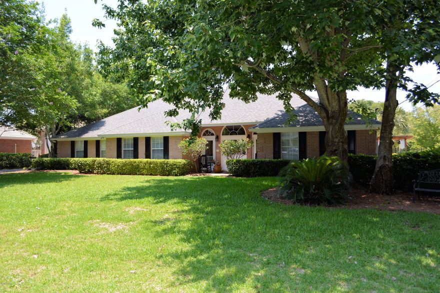 This home has everything you’re looking for!  Located in the highly sought after waterfront neighborhood of Kings Point, this home is completely updated/renovated and offers beautiful Hawaiian wood laminate and tile flooring, detailed wood trim and moldings throughout, and a resort like backyard.  Kitchen updates include new cabinets, granite countertops, stainless steel appliances, lighting and plumbing fixtures.  All the bathrooms were updated with new vanities, commodes, and fixtures.  This home was built on a split plan and offers spacious bedrooms and privacy.  The master suite boasts views of the boat lift and the pool.  It even has its’ own private patio area.  The master bath area is totally renovated with new vanity and a separate glass and tile shower. Two guest bedrooms share e a "Jack-n-Jill" bathroom and are both spacious and private.  The living room features a high ceiling, built-in bookcases and a cozy wood burning fireplace.  The 12x36 Florida room has so many options as a play room, home office, or extra living area.  But if that wasn't enough, the backyard will really make you say Wow!  From the beach entry in-ground saltwater pool with pavers, waterfall and spa, to the pergola, to the boatlifts for two boats...all landscaped and lighted for a resort like effect, you'll never want to vacation anywhere else but home!  The main boatlift was built to hold up to a 30 foot vessel, while the smaller lift was built to hold a smaller craft such as a flats or skiff style boat.  This home is situated outside of a flood zone in Bay County not Panama City and is also on a private well and septic tank.  You'll appreciate the low taxes and no monthly water and sewer bills.  Quality waterfront inventory is limited, so make plans to see this beautiful home today because it will be gone tomorrow.  All sizes are approximate, so please measure to be sure.