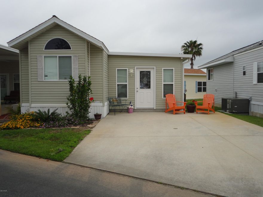 This is a very quaint, cute and well maintained gated community.  Come in and see this lovely beautifully landscaped community with pool, community room, fishing dock. The community is also bike and golf cart friendly.  This lovely decorated home has a large family room great for guests, nicely sized storage closet, eat in kitchen and 2 bedrooms with 2 full baths.  One of the baths has a walk-in shower.  Come and See

Back on the market due to financing fell through.