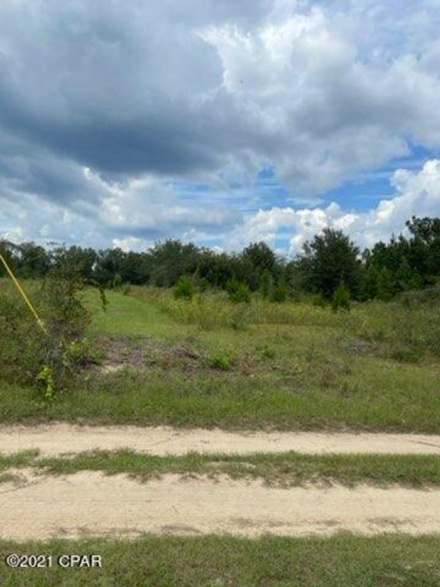 $50,000. 'CURRENTLY UNDER CONTRACT, SELLER ACCEPTING BACKUP OFFERS' Come enjoy this country setting for recreation, or select your perfect homesite on this parcel and settle here for peaceful, quiet living! This parcel is located approximately 35 miles from Panama City and the gulf beaches; Marianna just 30 minutes away. About 30-35% of the land is cleared and the rest is wooded. Power is available, but a well and septic tank would have to be installed to accommodate a residence. Owner also has an adjacent 20 wooded acres for sale (at $2,500/acre), if a buyer wants 40 acres instead of 20. Bring your walking shoes and check out this parcel (plus the adjoining 20 acres). ''Get the Florida sand in your shoes'' and start enjoying the simple country life. Many possibilities await a new owner!