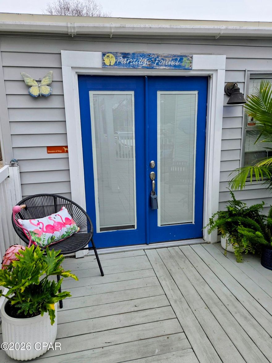 Welcome to Paradise Found - Your Dream Beach Home Awaits! Located on the desirable west end of Panama City Beach, this charming 3-bedroom, 2-bath beach house is the perfect retreat for those who love outdoor entertaining and coastal living. Whether you're looking for a primary residence, a second home, or a lucrative weekly rental, this property offers endless possibilities. Key Features: Spacious Living Areas: A bright and airy kitchen with stainless steel appliances, butcher block countertops, and a convenient island for meal prep or serving. A cozy breakfast nook, perfect for morning coffee. A dining room with a large table, ideal for hosting family gatherings. Outdoor Living at Its Best: A screened-in outside  room, perfect for relaxing with a book, watching football, or enjoying your morning coffee or evening wine. Perfect for soaking up the Florida sunshine .A newly updated front deck ,joints and skirting (2022)  
Bonus Features: A ''He Shed/She Shed'' for all your beach toys, power tools, and storage needs. A golf cart, affectionately named ''The Shark,'' included with the sale for easy trips to the beach Recent Upgrades Metal Roof (April 2017)New HVAC system and blower box (2022)New front door (2022) New sewer cleanout line (2020)Paradise Found comes fully furnished with very few exceptions. A detailed list of excluded items is available upon request .Prime Location: Walking distance or a quick golf cart ride to the World's Most Beautiful Beaches. Close to local favorites like Carousel Supermarket, Thomas Donuts, and Mike's Diner and Oyster Bar .Conveniently located near 30A, Pier Park, Dolly Parton's Pirate Adventure, and Top Golf
This home is more than just a property—it's a lifestyle. Don't miss your chance to own a piece of paradise in Panama City Beach. Schedule your showing today!