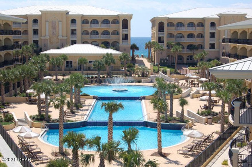 This a luxurious gulf front 4 BD 3BH condo with a large ''Bunk room'' located in the Beautiful and well-designed and gated Adagio complex.  Breath taking water views from windows and large 4th floor balcony.  This unit comes with a designated underground parking space and a private storage unit close to the elevator.  New Appliances in 2018:  Stainless Steel refrigerator/freezer and a Convection Stainless electric oven.  Gas stove and Fireplace.  The Gulf front pool is heated but, not the large pool in the center of the complex.