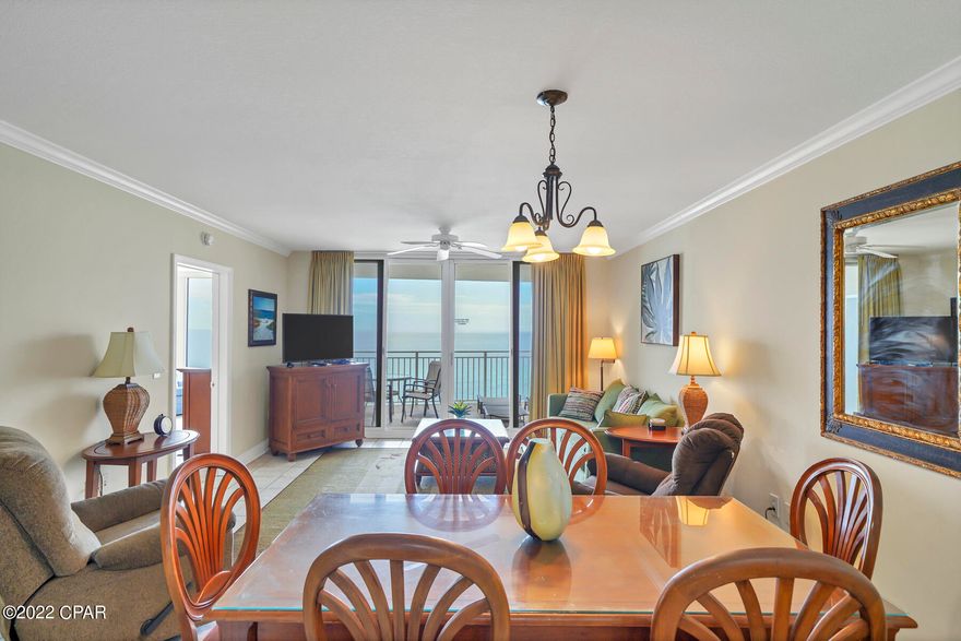 Direct Gulf Living at its finest! Exceptional opportunity to own a premier, luxury condo at Emerald Beach Resort. This beautifully Furnished ''Aruba'' plan offers 2-bedroom/2-bath and extra bunkbed area in an ultra-spacious floorplan. Enjoy sweeping Gulf views from the Living Room, Kitchen, Master Suite, and expansive Balcony. Premium interior finishes include tile flooring throughout the main area, luxury vinyl plank in bedrooms, crown molding, granite counter tops, whirlpool tub and a Bonus area for Bunk beds. Meticulously maintained: New kitchen appliances 2020, New HWH 2021, HVAC replaced 2016, mattresses replaced every 3yrs, new side by side washer and dryer 2022 in renovated laundry area 2022. Guest bedroom features dual queen beds for maximum rental income potential! Emerald Beach Resort is conveniently located just 15 minutes from the new, International Airport and within walking distance from Pier Park with is hundreds of shops, restaurants, and entertainment. Emerald Beach Resort is one of the few full-service beach resorts! This popular resort features gulf side pools, hot tubs, tiki bar, glass Sky Bridge with restaurant & lounge, fitness center with spa, 8 high speed elevators, conference center, Starbucks, and covered parking garage. With excellent rental history, this property is the perfect Investment choice! * Guy Harvey print does not convey!