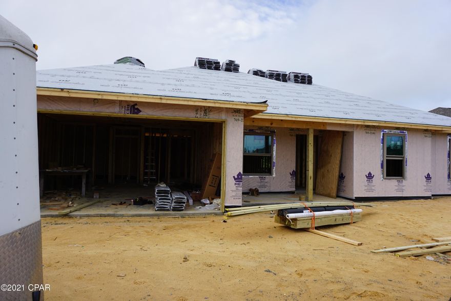 Under construction, luxury 3 bedroom 2 bath all brick home that offers large open floor plan, Master bath with his & hers double shower with Rain maker (3 shower heads) and shower seat, double vanity, large master bedroom with built-in rope lighting and large walk-in closets. The kitchen is a dream with all real hard wood cabinets, granite countertops, stainless steel appliances, cabinets in the laundry room. Living room has electric fireplace,and wired for entertainment. Home comes with large front porch, back covered and open back porch, security system, thermoseal spry foam system and generator ready electrical outlet with cord. outside shower and sprinkler system. Hurricane built See pictures. Lock in price before it go up