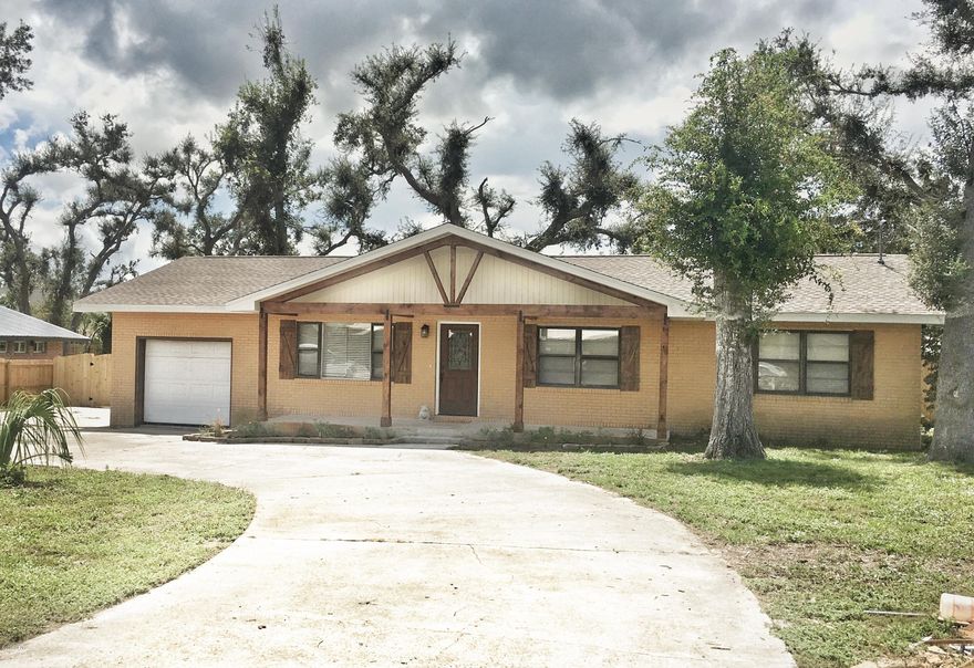 DONALSON POINT completely remodeled & renovated CRAFTSMAN STYLE home with INGROUND POOL-- Move-in Ready!  Super convenient to Tyndall Air Force Base, it sits on nearly 1/2 acre a block from a deep water public boat ramp accessing East and West Bay, as well as the Gulf of Mexico. The home boasts an open floorplan in the living, dining, and kitchen, and a separate den that leads to the large, privacy-fenced back yard and pool area. The kitchen has all new cabinets, new stainless steel appliances, a wonderful kitchen island/breakfast bar with new granite countertops. New plank flooring has been added throughout the home and all three bathrooms are completely remodeled.  The roof is brand new, as are the water heater and insulation.  Home has low maintenance brick exterior & a single-car garag