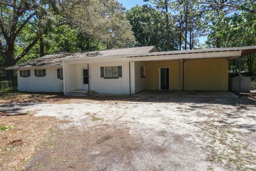 A three bedroom, two bath, 1650 sqft property a minute away from Tyndall Parkway. It has a large lot that is 150 x 200. Property features spacious closets in every room of the house, open concept in the kitchen and living room, and also an indoor storage area! There is a storage unit in large .68 acre fenced lot in the city limits! Walmart, Restaurants are within Walking Distance. Tyndall AFB is just 10 mins away...Nice enclosed back porch. All the bedrooms are great sized. Lot is completely fenced. Close to schools and parks. On top of it all you are Mins to public boat ramps, beach and the Gulf of Mexico.  Mexico Beach is about 20 mins away. Want to live in paradise on a skeleton budget? This is the place for you. All sizes are approximate, please measure if important.