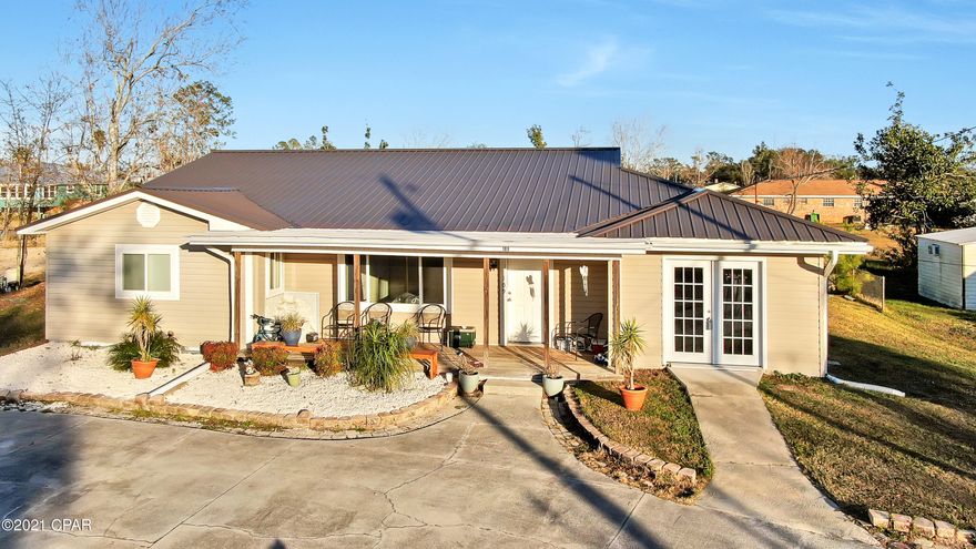 CURRENTLY UNDER CONTRACT, SELLER ACCEPTING BACKUP OFFERS - Space & Location! This Lynn Haven spacious home offers 4 large bedrooms, extra large laundry room beautiful  kitchen with granite counter tops and plenty of cabinets.  A circular driveway puts you in front of the large covered front porch to relax on & wait until you see the large back yard.  When you enter the large foyer you see all the space waiting for your family.  New roof, new AC unit & new floors this home was remodeled in 2018 & even comes with lawn equipment.  Offers 4 bedrooms  2 1/2 Bath or 4th room could be office, game room or mancave. Conveniently located near everything Lynn Haven has to offer.  Walk to A.L. Kinsaul Park & watch a beautiful sunset.