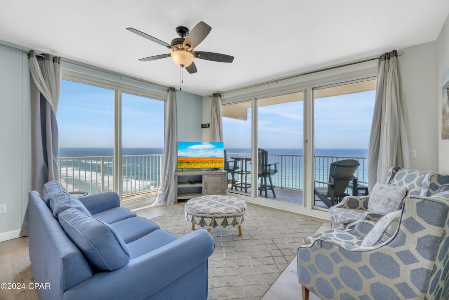 CORNER UNIT with WRAP-AROUND BALCONY! Enjoy the best of both worlds from Shores of Panama Unit 1831, where you can watch both sunrise and sunset from your private corner unit and wrap-around balcony, offering unobstructed views of the coastline of Panama City Beach, Florida, and its stunning emerald waters!
Shores of Panama 1831 is a 3-bedroom, 3-full-bath unit with DEEDED parking on the 9th floor. The unit was beautifully refurnished in 2021 in a coastal style. The kitchen features stainless steel appliances, and the master bathroom includes a large tiled walk-in shower with a glass wall. New LVP flooring runs throughout the unit. Additional features inside the unit include a stackable washer and dryer. The unit conveys fully furnished and rental-ready.
The wrap-around balcony can be accessed through three doors: two sliding glass doors in the living room and a private door from the master bedroom. A large picture window in the dining area faces southeast, providing expansive views from the dining, kitchen, and living rooms down the beach. This unique 31 stack offers views that are unmatched in the building and should not be missed.
Shores of Panama Resort Condominiums are world-renowned for their massive resort-style lagoon pool complete with a hot tub and Tiki bars. Other amenities include an indoor heated pool, spa, fitness center, sauna, steam room, and in-resort shopping. All information and HOA fees are deemed correct; buyers should verify if they are important.