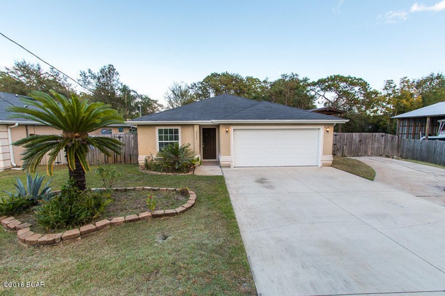 Not your typical 3 bedroom 2 bath home! Not only is the location and price great, the upgrades both inside and out are endless!!! A 24x14 florida room with double paned windows,  a covered RV/Boat parking, an oversized lot with an extended driveway, a custom built yard building, well for the sprinkler system, a privacy fence, and upgraded flooring are just the beginning of the endless amount of upgrades the seller put into this home.  This home is an absolute must see if you’re looking for a quiet and safe area convenient to shopping, dining, and schools. The open floor plan, natural lighting, and vaulted ceilings give this an even larger feeling. The kitchen features plenty of cabinets and countertop space if you enjoy cooking and/or entertaining friends and family. The owners have taken very good care of this home and it shows the moment you pull up. They've also recently painted the interior and made this home move in ready!