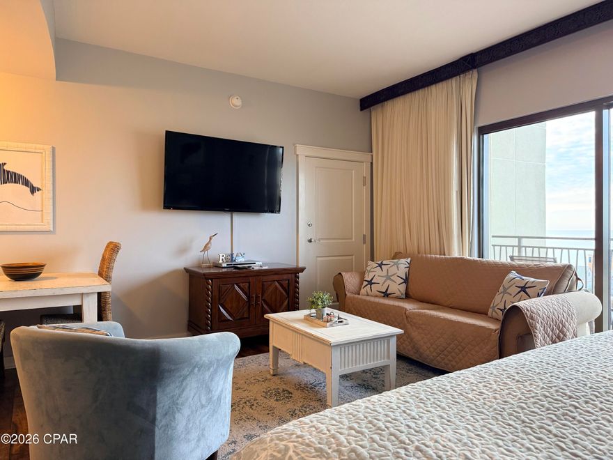 Here is your opportunity to own a west facing, SUNSET Gulf view studio at Origin!  Unit 1009 is a large studio with an impressive 541 square feet, and a layout that makes this condo unique from the standard studio units at Origin.  As you enter unit 1009, you'll first notice that this isn't the average ''shotgun style'' studio unit.  Directly in front when you enter is the living area and glass doors to the balcony, while the king sized bed is tucked away to the left, and the kitchenette is tucked back to the right.  This is a very spacious studio layout, comfortable and cozy, with the ability to sleep 4.  The full bath features a tile surround tub and shower combo, and a large vanity.  The kitchen has all you need to cook a meal in with the 2 burner cooktop, microwave.  If you have leftovers instead, you'll find plenty of room for those in either the two refrigerators.  Through the large sliding glass doors, you have unobstructed Gulf views, and sunsets every night, as well as beautiful nightlights from the strip, and Pier Park.  You can also enjoy one of the the many firework displays shot off the city pier right from the comfort of your own balcony.  Unit 1009 is being offered fully furnished and rental ready.  Origin offers many amenities including two BBQ grill/picnic areas, a heated pool, hot tub, theater, game room, laundry facility, vending. a gated community with 24 hour security, and retail on site including Starbucks coffee, convenient store and grill, and Sunsations beach store.  Do not miss your opportunity to see this amazing property.  Call it home, call it your private vacation getaway, call it your first or next investment...either way, call me to schedule your showing today!