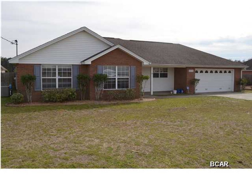 Very neat and clean 3 bedroom, 2 bath home located within walking distance to Tommy Smith Elementary and Merritt Brown Middle School. This home was built by a well known local builder with quality in mind. The interior is open with the bright and airy kitchen featuring stainless appliances, loads of cabinet space, a break fast bar plus an eat in area for formal dining. The living room is centered around a fireplace and features durable wood flooring. Just off of the living room is an outdoor, screened in living area overlooking the HUGE back yard. The master bedroom is split from bedrooms 2 and 3 and features a walk in closet and master bath with double vanities and a separate tub and shower combo. Bedrooms 2 and 3 share a full bath and are located close to the laundry room for convenience. The exterior of the home built for durability with a mostly brick exterior with vinyl accents. A two car garage with an extra workspace takes care of car storage. The lot measures 103x135 with plenty of room for a pool, boat parking or a detached work shop. Homes in Cherokee Heights sell fast so call and make an appointment to see this one TODAY!