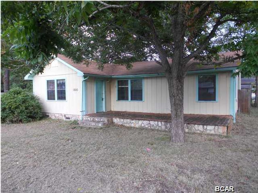 * BANK OWNED * Rustic Charm, corner lot completely fenced in. Large living room w/fireplace and beamed ceilings, big kitchen and dining room, needs rehab.  Just 2 blocks from the East Bay and close to Hathaway Bridge and beaches.

 Bank uses Omega Title, Grace Trucks. must use ''AS IS'' contract and attached the seller disclosure and addendum must be with offer to present. Cash Only contracts must have verification of funds with contract to present. Sold AS IS only no finance contracts will be accepted.