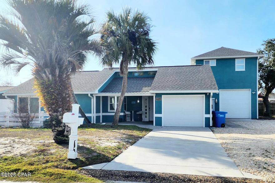 Welcome to your private coastal retreat, thoughtfully updated and designed for relaxed beach living. From the moment you step inside, soothing sea-inspired colors, vaulted ceilings, white beadboard accents, and natural light create an open, airy feel that instantly feels like vacation.

The main home offers convenient single-level living with 3 bedrooms and 2 bathrooms, including a comfortable primary suite with a king bed setup, generous storage, ceiling fan, and a spacious walk-in shower. Two additional guest rooms provide flexible sleeping arrangements, including a queen bedroom and a bunk/trundle room ideal for kids or guests. A dedicated laundry room with full-size washer and dryer adds everyday convenience.

The updated kitchen features stainless steel appliances, ample workspace, and a charming coffee and tea station. The adjacent dining area seats 8, with additional covered patio dining nearby for easy indoor-outdoor entertaining.

A major standout is the detached second-story private studio suite, accessed from the courtyard. This self-contained space features a king sleeping area, comfortable living area, kitchenette with full-size refrigerator, microwave, Keurig, dining space for 4, private bath with dual-head walk-in shower, and its own stacked washer/dryer. Step outside to the private deck with seating and a grill -- perfect for guests, extended family, or added rental flexibility.

Out back, the property truly shines. Enjoy a private backyard oasis with a large pool, Trex decking, sun lounge area, and a covered outdoor living space designed for relaxing, entertaining, and enjoying the Florida lifestyle.

With updated interiors, flexible guest accommodations, strong indoor-outdoor living, and a resort-style pool area, this home is an ideal primary residence, second home, or vacation rental opportunity.
