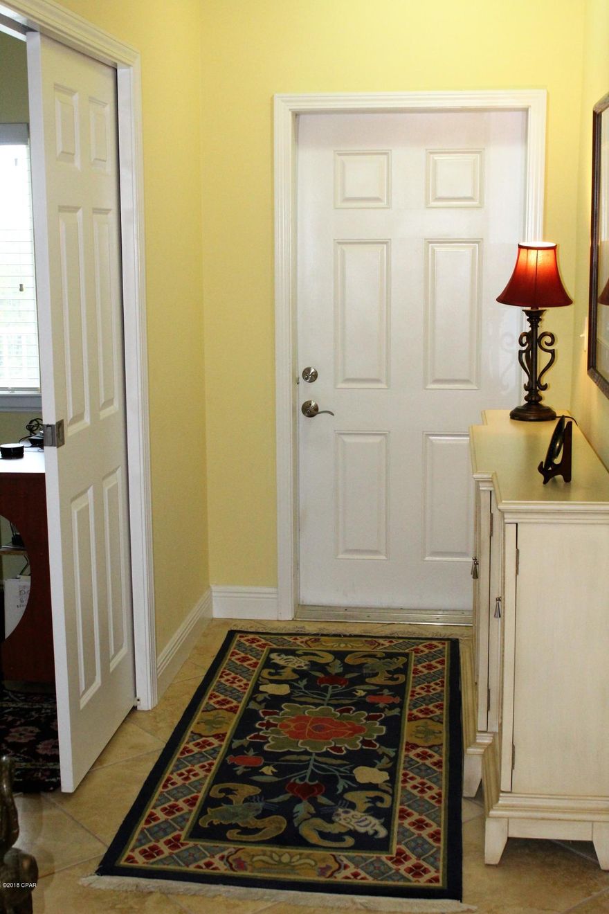 Luxurious and Immaculate Bay Front Waterfront condo with Breath Taking Views in gated Beautiful Magnolia Bay Club.  Unit is a 3 bedroom with one bedroom being used as an office, 2.5 baths as the hall tub has been removed and storage put in it's place (plumbing there if you wish to change back to full bath) Master Bedroom Suite with Sliding Door leading to the Balcony and Large Luxurious Master Bath with Whirlpool Tub, Separate Tiled Shower and Double Sinks.  Kitchen has upgraded Bosch appliances and a Jenn-Air stainless side by side refrigerator.  Come and See!!