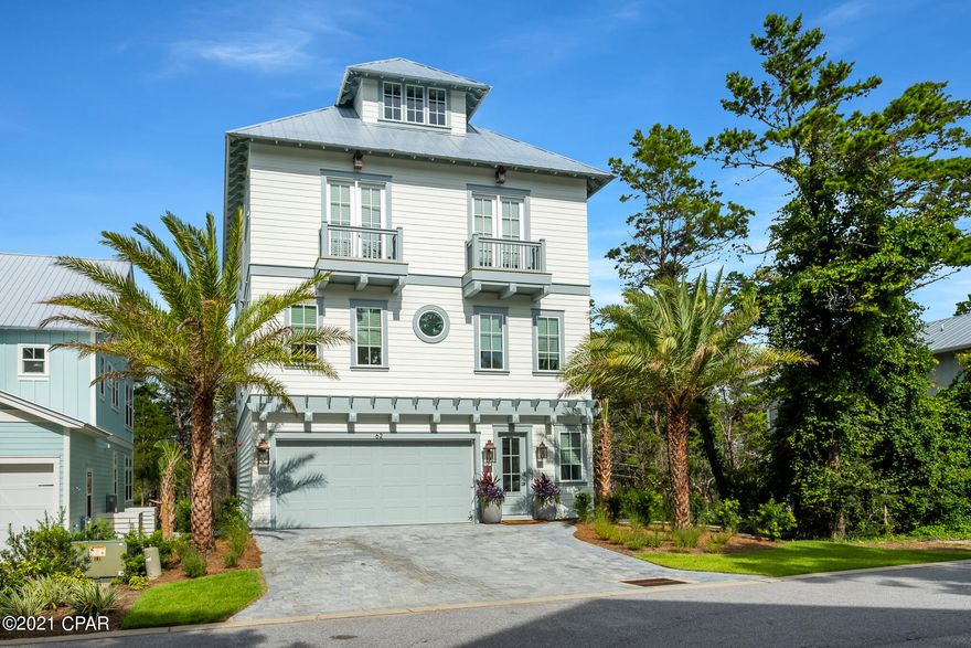 Welcome to 62 Grande Pointe Circle, located in the beautiful community of Grande Pointe in Inlet Beach. This newly constructed home offers over 3700sqft. of living space. This five bedroom, four bathroom home was built for entertainment. Fusing coastal and contemporary styles, this masterfully designed and thoughtfully outfitted residence offers high ceilings, stunning floors, open concept living and unique touches throughout. Looking across the oversized center island to Camp Helen state park, the epicurean in your life will appreciate the oversized range and refrigerator, farmhouse style sink, large pantry and impressive quartz countertops atop custom cabinetry The large open concept living area will be the perfect location to make memories and enjoy the coastal lifestyle. The master suite, featuring a large screened in porch offers the perfect retreat after a day of playing along scenic highway 30A! Each additional guest suite will be a welcome respite for family and friends. A large bonus room on the fourth floor has been set up with a variety of games that will bring out the kid in everyone! Enjoy fresh air, sunshine and gulf views from the outdoor viewing deck. An extra large screened in porch, elevator, Sonos speaker system throughout, office space and bunk room complete this impressive home.

Grande Pointe offers homeowners a prime location to 30A, the beach and Lake Powell. Living in the beautiful community of Grande Pointe is unparalleled. Enjoy the trails and history of Camp Helen, conveniently located next door. Explore magnificent Lake Powell by kayak or launch your board at the community dock and paddle to the beach in a short twenty minutes. Really relax and connect with nature at the community pool that is surrounded by giant shade trees, a tranquil fountain and overlooks Lake Powell. You are one half mile from four wonderful public beach accesses, one half mile to the underpass that will safely get you to 30a and the current convenience of the bike path on the north and south side of 98 that will safely get you where you need to go. Craving sushi? In the mood for something sweet? You are just a stones throw from The Shoppes@Inlet, providing a little something for everyone...You are located approximately one mile from the world famous 30A corridor, and in close walking proximity to the shopping and dining experience that 30Avenue has to offer. With options for groceries and other needs only two miles to the east, this gorgeous home checks every box to make lasting memories at the beach. Schedule your private tour today!