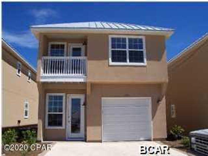 CURRENTLY UNDER CONTRACT, SELLER ACCEPTING BACKUP OFFERS. Vacation Rental allowed! 3 bedroom, 2.5 bath home in located on Thomas Drive, just steps from the World's Most Beautiful Beaches. The interior of the home features hardwood floors in the kitchen and living room, maple cabinets and upgraded countertops. All 3 bedrooms are upstairs, Master bedroom has a balcony and a beautiful gulf view! Other two bedrooms have a balcony and poolside view. There is a community pool just off of the living room and private one car garage. All info taken from appraiser site and sizes approx., please verify.