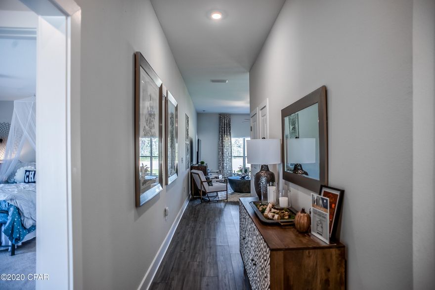 3 Bedrooms, 2 Baths, this Denali floor-plan home is a must-see, with a stunning interior featuring 10' high ceilings in the main living areas and a 9' tray ceiling in the owner's suite. Luxury Vinyl Plank floors, granite countertops, and so much more are found throughout the home. The exterior boasts Hardie Board siding on all four sides of the home, tankless gas water heater and a landscaped, large corner yard with an included sprinkler system.