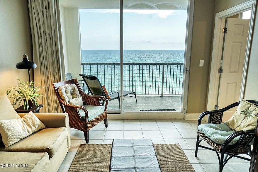 This one of a kind property conjures up images of sun-splashed days of swimming, biking, and relaxing. It lives like a beach house but comes with all the benefits of owning a condo. Property will convey with luxurious furnishings, window treatments, and artwork that welcome you to lie back, relax, and enjoy panoramic views of the pool, beach and ocean. Open floorplan and 9' ceilings allow for fabulous Gulf and sunset views from balcony, living room, dining room, kitchen, & master suite providing the ultimate alfresco living and entertaining environment! Sunset views from the generous, private, balcony are a perfect end to a sunny day and beginning to an exciting evening. MAIN MASTER SUITE is front and center on the beach with direct access to the main balcony and private bath complete with garden tub, separate shower, and large walk-in closet. The master suite opens from a glass slider door to a covered balcony. LUXURY! COMFORT! CONVENIENCE! Can be configured to sleep up to 10 people! EXCELLENT RENTAL INCOME POTENTIAL. Enjoy the good life at Majestic Beach with an unparalleled deck of resort style amenities including: 650 linear feet of sugar white GULF FRONTAGE, Four Large outdoor pools (2 at Tower I and 2 at Tower II), Two Indoor heated pools (one in Tower I and one in Tower II), Two hot tubs, Baby pool, Wading pool with waterfall, H20 Bar and Grill serving Gulfside/Poolside lunch and dinner, Large outdoor dining area, State of the Art Fitness center with steam room and sauna, 130 seat Stadium seating Movie Theatre, Convention center, Private Owner's Lounge with full Kitchen, Tennis Courts, Majestic Market featuring Starbucks coffee. Quick distance to the wonderful shopping, dining and entertainment at Pier Park. FROM THIS CONDO, YOU ARE WITHIN STEPS OF EVERYTHING YOU COULD EVER WANT AT THE BEACH!