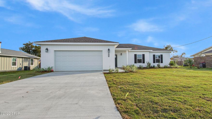 BEAUTIFUL NEW CONSTRUCTION CRAFTSMAN style home, conveniently located to TYNDALL. This spacious home is built in a traditional established neighborhood, NO COOKIE CUTTER HOMES HERE! The exterior offers a large covered porch, over sized 2 car garage and sprinkler system. Once inside, you'll love the OPEN FLOOR PLAN with LVP FLOORING THROUGHOUT (no carpet here!), light and bright living area and split bedroom plan. The kitchen features WHITE CABINETRY, GORGEOUS QUARTZ COUNTER TOPS and a HUGE ISLAND, perfect for entertaining! The private primary bedroom offers a walk in closet and a great bathroom with double vanities and an elegant tile shower. 3 guest rooms allow for everyone to have their own space or a great home office.  NO FLOOD INS REQUIRED and NO HOA's.