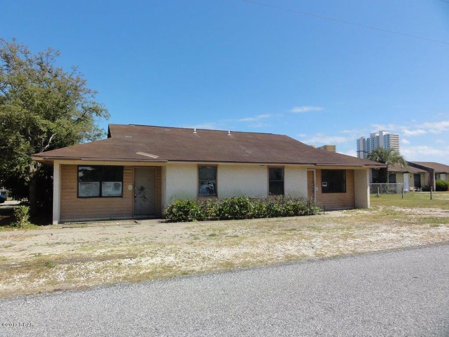 Great duplex on a level, corner lot! Just a 5 minute walk to the beach! Each unit has a spacious living room, separate dining area, kitchen, laundry, two bedrooms, and a full bathroom! A must see! Submit your offer today!