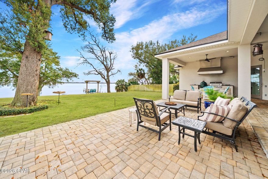 Escape to your own slice of WATERFRONT paradise in this stunning 2018-built sanctuary on .71 acres, where every day feels like a vacation. Nestled along the pristine waters of St. Andrews Bay on one of the most coveted streets in Panama City, this home offers no HOA and brings single level living and relaxed waterfront living to life.

Wake up to breathtaking water views from nearly every room, then step outside to your private oasis featuring a boat lift and dock, your gateway to endless adventures on the emerald waters of the Bay and Gulf. Whether you're casting a line at sunrise, hosting sunset cocktails, or simply watching dolphins play in your backyard, this home transforms everyday moments into cherished memories. 

The thoughtfully designed single-level layout embraces effortless entertaining and comfortable daily living, while the home's modern construction ensures worry-free ownership with contemporary conveniences and energy efficiency. Offering high ceilings, split floor plan, a home office, a waterfront bonus room, and 4-car garage, this single story home lives big at 3,427 square feet. 

Location couldn't be more perfect. Enjoy the serenity of waterfront living while staying just minutes from downtown Panama City's vibrant dining, shopping, and cultural scene. Launch your boat for a day of fishing or hopping over to Shell Island, then return home to watch the sunset paint the sky from your own private waterfront retreat.

This is more than a home. It's your personal resort where coastal dreams become reality. No HOA means the freedom to truly make this waterfront paradise your own. Your waterfront lifestyle begins on Bunkers Cove Road!