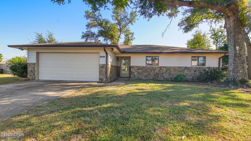 'CURRENTLY UNDER CONTRACT, SELLER ACCEPTING BACKUP OFFERS' Welcome Home! This charming 3BR/2BA home approx. 1,767 sqft has been completely redone since the hurricane and is move in ready. Interior features include new carpet in all bedrooms, new vinyl plank floors in living room/dining/kitchen & hallway, fireplace, kitchen is very spacious with all new custom cabinets, new counter tops, new stainless steel appliances, and new custom island, bathrooms have been updated with new custom vanities & new countertops, all new plumbing fixtures, and new toilets, the owner did not spare any costs on the updates throughout the home and even updated the laundry room from the garage to an inside heating and cooled laundry room. Owner had all the electrical updated to code with new wiring, added recessed lighting in living room, all new light fixtures throughout, new Carrier 14 seer heat pump system installed, and new duct system installed in 2021. The exterior features include new roof in 2019, new vinyl Siding and vinyl soffits in 2022, a large enclosed back patio and new exterior light fixtures. This home is an absolute must see, so call your favorite Real Estate Professional today and come see this beauty!