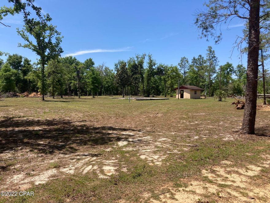 Nice 1 acre lot that is cleared and has a well in place. Power pole in place. Great building lot or for mobile home. Small cinder block shed on property as well as a slab from previous structure. Close to 231. ALL Measurements approx. All structures as-is.
