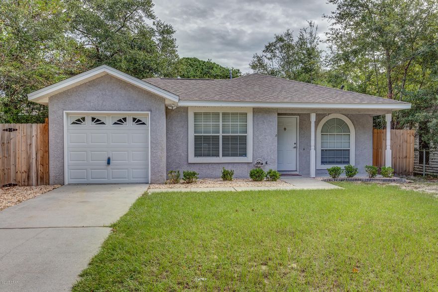 Perfect home in ST. ANDREWS for a first-time homebuyer! FULLY RENOVATED kitchen with granite countertops, stainless steel appliances, light fixtures, engineered vinyl plank flooring, updated light fixtures, new vanities with vessel sink and granite top in all baths, all laminated wood floors - NO carpets, Laundry room with front loader washer and dryer! Private fenced  backyard and one car garage. New ROOF in 2016! All measures are approximate, please verify if important