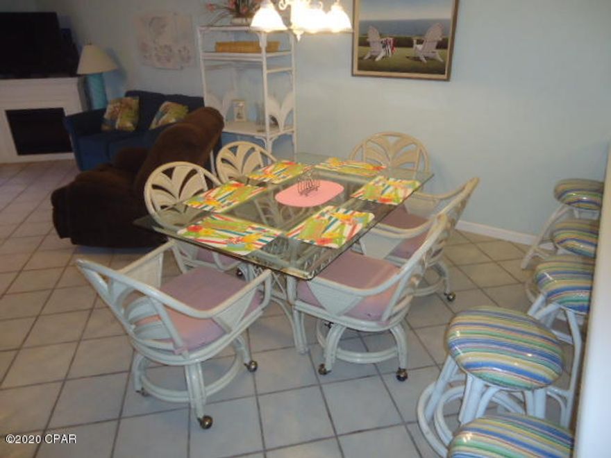 Age, SF, and dimensions approximate. End unit in good condition, This ''Glassback'' is located close to beach walk and mini-golf. Golf cart parking in addition to 2 parking spaces. Complex has 11 pools to include clubhouse with pool on the beach. Gated community and pet friendly.