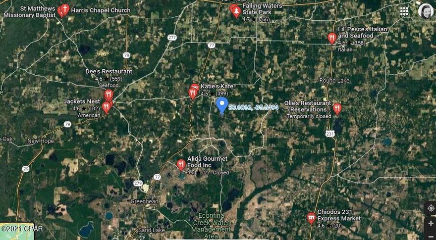 Beautiful wooded property in the highly desired neighborhood of Sunny Hills. Sunny Hills is known for its access to fresh and saltwater fishing as well as an 18 hole golf course with a club house. Close to stores, restaurants, and main highways, yet very quiet and tranquil neighborhood.  The parcel next door is for sale also so you can have over an acre in this amazing community!