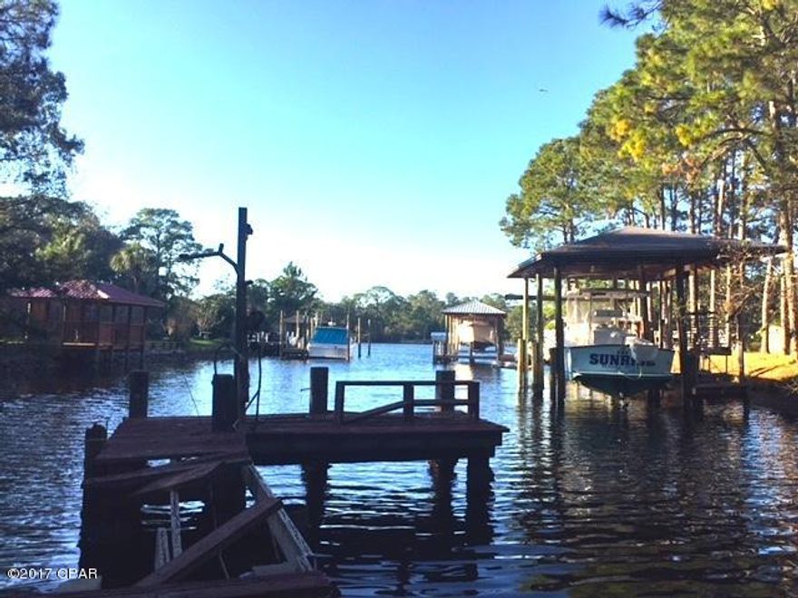 This waterfront property is an estate sale. The property has been vacant for several years. The estate is selling the property As IS without any warranties. The personal representative does not have any information about the property and will not be furnishing disclosures. The utilities are not on but will be turned on for the inspection once we are under contract. We encourage the buyer to have an inspection.According to tax appraiser's office there is 32 feet water frontage.