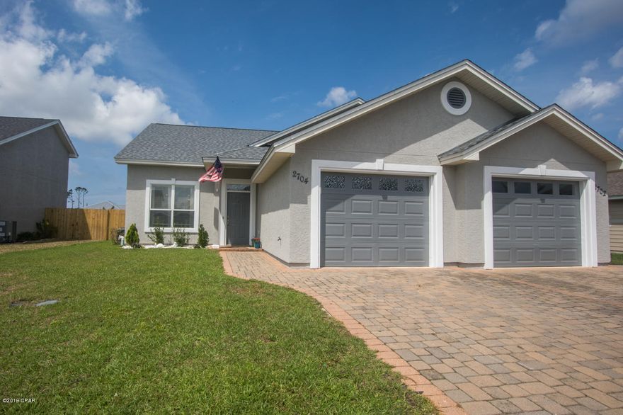 COME FALL IN LOVE with this 3bd/ 2 1/2 bth townhome conveniently located in the heart of Lynn Haven and priced to SELL! Step foot into this tastefully finished home, complete with all updated lighting fixtures, ceramic tile and newly installed luxury vinyl flooring in the master. Large Master suite is located on the bottom floor with adjoining en-suite with upgraded shower, and walk in closet. Open concept Kitchen, Dinning, and Living area is perfect for entertaining. 

New roof, AC replaced in 2017, New Paint, new carpet upstairs in spare bedrooms, new fence, new sod. This home is a MUST SEE.