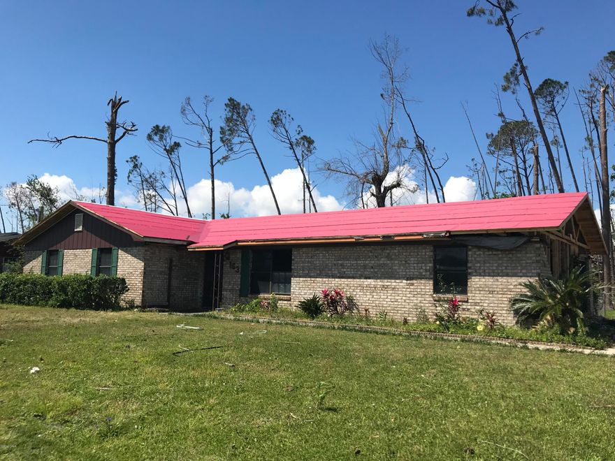 AMAZING fix & flip opportunity here - It's a 3 bedroom / 2 Bathroom, 1,731 sq. ft. (heated) and 1,999 sq. ft. (total) brick home! And the owner just finished putting on a NEW ROOF! It has some damage from Hurricane Michael - will need some brick work and rehab inside as you can see from the pictures, but there is HUGE MARGIN on this one! It has already been stripped and ready for rehab! It's a big corner lot, the electrical, A/C, flash water heater, etc. are all good. Don't wait - It won't last!      ----- CASH BUYERS ONLY -----