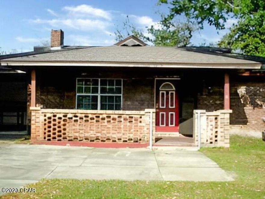 THIS ALL-BRICK HOME IN THE HEART OF LYNN HAVEN has so much potential!  The home features a spacious Great Room with a brick-walled fireplace, kitchen with eat-in nook, separate dining room and a large family room off the back of the home.  The Master bedroom has a full bath that can be accessed from the family room as well, and the additional two bedrooms are a good size.  Situated on a corner lot, there is an over-sized one-car garage, and, the backyard is fenced with a large cement pad that is perfect for an RV/boat.  Don't miss the opportunity to turn this house into your ''home!''