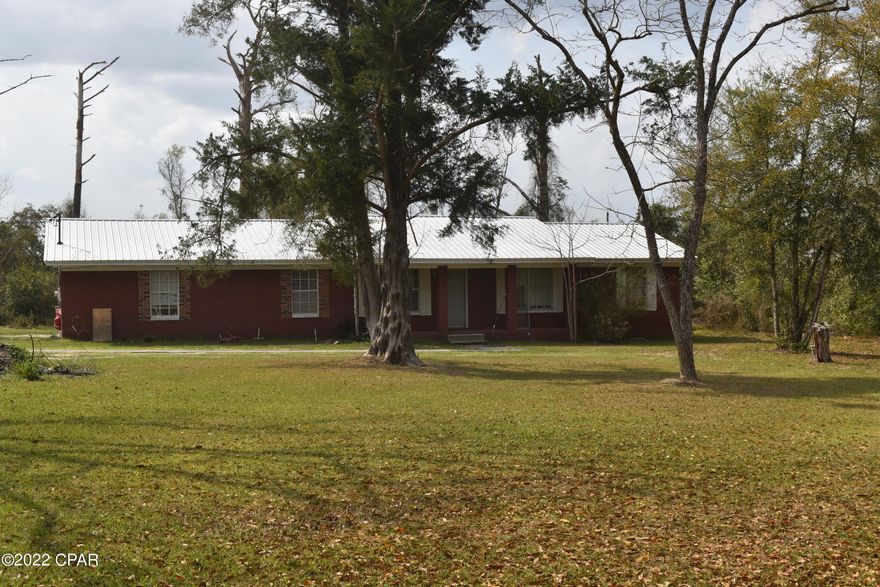 Ranch style brick home being sold with approximately 1.7 acres. On a paved road. 

House is now vacant. Owner is in process of cleaning it up. If you are looking for a fixer upper then this might be the deal you are looking for. Owner will entertain all as is offers. Seller is offering a flooring and appliance allowance at list price. Contact listing agent for information on showing. 

All measurements are approximate measure to verify.

Updated Roof, A/C, Hot Water Heater & Electric Panel.

The back 2 acres of this parcel is not included in this listing.
