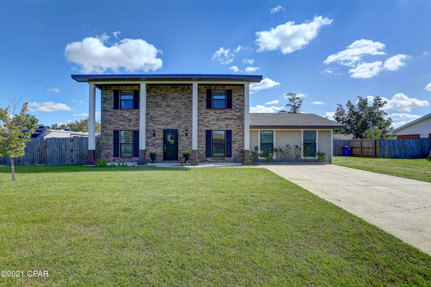 'CURRENTLY UNDER CONTRACT, SELLER WILL CONSIDER BACKUP OFFERS' Beautiful well maintained 4 bedroom 2.5 bath, nearly 2400 sqft Heated & Cooled. This fully updated home is located in the desirable & centrally located Venetian Villa residential subdivision. No HOA Fees, Located in Flood Zone X- No Flood Insurance Required. This home has a spacious floor plan with Living room, office area, Kitchen, formal dining, large den with electric fireplace & laundry room on the first floor. The kitchen has been fully updated & comes complete with all appliances, granite countertops, kitchen Island & has easy access to the huge covered outdoor living area. Your family & guests are sure to enjoy the outdoor living space- red maple trees, camellias, roses, hydrangeas, lemon tree & crepe myrtles set the tone 2 gates- 1 standard & 1 large gate big enough for a boat or camper, Fire pit area, new custom children's playset, plenty of covered outdoor entertaining areas, 2 storage sheds, shallow well so buyer can install irrigation system & never pay for water usage & much more! The Interior has a wonderful flow with main living area downstairs & bedroom upstairs. The Master suite is spacious with double closets & private bath with stand up shower. There is also 3 other spacious bedrooms & an additional Full bath upstairs which is fully updated & has a tub/shower combo. This has been FULLY updated! New HVAC, New windows & doors, LVP & ceramic tile throughout! Don't miss out on this beautiful property! Quiet neighborhood- quick bike or golf cart ride to the park to picnic while watching the sunset on the Bay! Close to everything- hospitals, grocery stores & entertainment. Quick 20 minute drive to the white sandy beaches! *Measurements approximate please verify if needed.