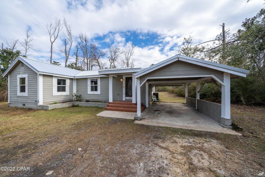 CURRENTLY UNDER CONTRACT, SELLER ACCEPTING BACKUP OFFERS' This cozy 3 bedroom home sits on a little over 1/2 an acre of land. The home has been renovated with new luxury vinyl tile flooring, granite countertops in the kitchen, fresh paint, new water heater, roof, and windows except for two original windows in January of 2022. The home has all new electric range top stove, dishwasher, microwave and garbage disposal. There's an above ground drain field for the septic tank This would make a great starter home, rental investment, or home for someone needing to store equipment.  Call to preview TODAY!