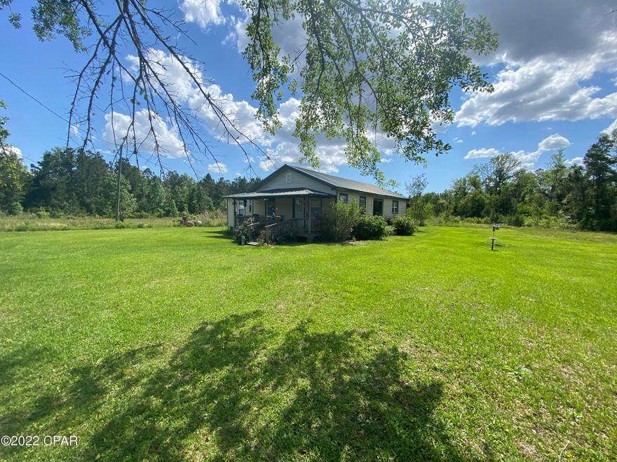 CURRENTLY UNDER CONTRACT, SELLER ACCEPTING BACKUP OFFERS. 3 bedroom, 1 bathroom home on 160 acres. The home has a large laundry room, and an office. There is also a 30 x 40 shop on the property. The location of this parcel is close to Hwy 90 and I-10.