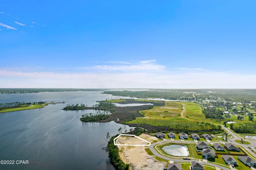 Waterfront lot! This lot is over .50 acres, come build your dream home on this lot.  It sits on Hodges Bayou which then opens up into North Bay.  The sunsets are absolutely beautiful!