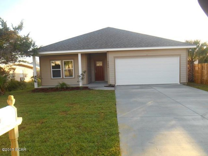 New Construction complete and ready for new owner.  Three bedroom 2 baths, 1450sf Heated and cooled. Total of 2221sf under roof. Stainless steel appliances, tile floors throughout home, Granite counter tops, covered patio and front porch.  Lot is located 2 block from beach.  Listing Broker has a equity interest in the property