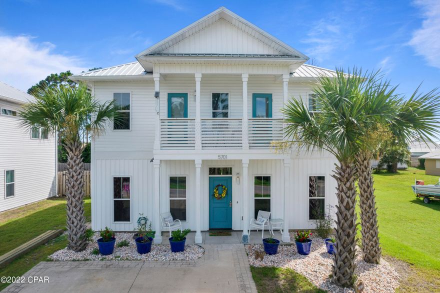 MOTIVATED SELLER, BRING YOUR OFFER!! This gorgeous ''Rosemary Beach'' style home offers an open floor plan, with the master bedroom on the first floor. The kitchen has custom cabinets, granite counter tops, and an abundance of natural light. Upstairs you'll find 4 bedrooms, 2 of them with balcony access. The backyard is fully fenced in so you can let your pets and children play at ease. Walking distance to the beach, and a very short ride to the closest boat ramp. Short term rentals are allowed so ask your Realtor for the rental projections that have been provided!