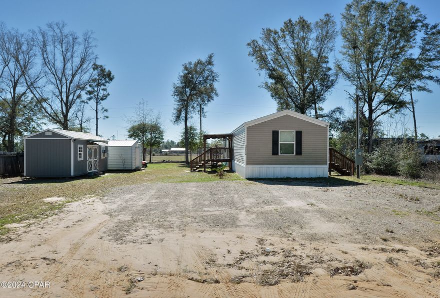 Welcome to your serene retreat nestled in the tranquil countryside! This 2019 doublewide mobile home offers a perfect blend of comfort, convenience, and rustic charm. Boasting 3 bedrooms, 2 bathrooms, and a range of desirable features, this residence promises a lifestyle of relaxation and enjoyment.Enjoy the luxury of a large master bathroom equipped with a separate shower and a rejuvenating jacuzzi tub, providing the perfect oasis for relaxation after a long day.Additional storage space provided by a convenient storage shed, ideal for keeping your outdoor equipment, tools, and other belongings organized and secure.Embrace your hobbies and projects in the separate workshop, complete with electricity for added functionality and convenience.Escape the hustle and bustle of city life and immerse yourself in the tranquility of the countryside, offering a serene backdrop for enjoying nature and outdoor activities.This charming mobile home is the epitome of comfortable living in a picturesque rural setting. Don't miss out on the opportunity to make this your dream home! Contact us today to schedule a viewing and experience the peaceful lifestyle awaiting you in this lovely property.