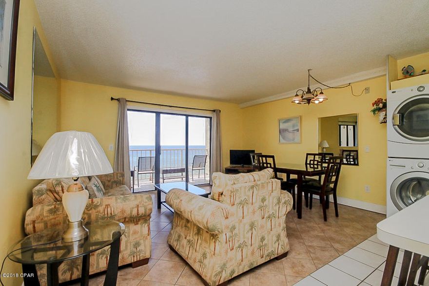 Beautiful unit on the perfect floor!! Step into paradise when you enter this fully tiled unit that boasts new cabinet facings, tile backsplash, washer and dryer, hall bunks and more!! Enjoy the views while drinking your coffee on your tiled balcony overlooking the beautiful Gulf of Mexico. You can't go wrong with this unit!! The Summit offers a gated community, two pools, two hot tubs, tiki bar, game room, fitness center, tennis courts and more! You do not want to miss this opportunity to buy at The Summit!!
