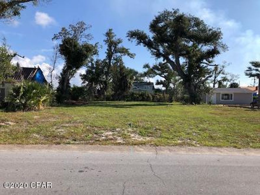 High and dry lot ready to build your home on.  Water is on site. Not sure about sewer.  There is a sewer clean out but don't know if  it was for a septic tank or city sewer.

There was a 1 bedroom 1 bath house on the property that was removed by Panama City code enforcement.  So there should be some impact fees credits available.