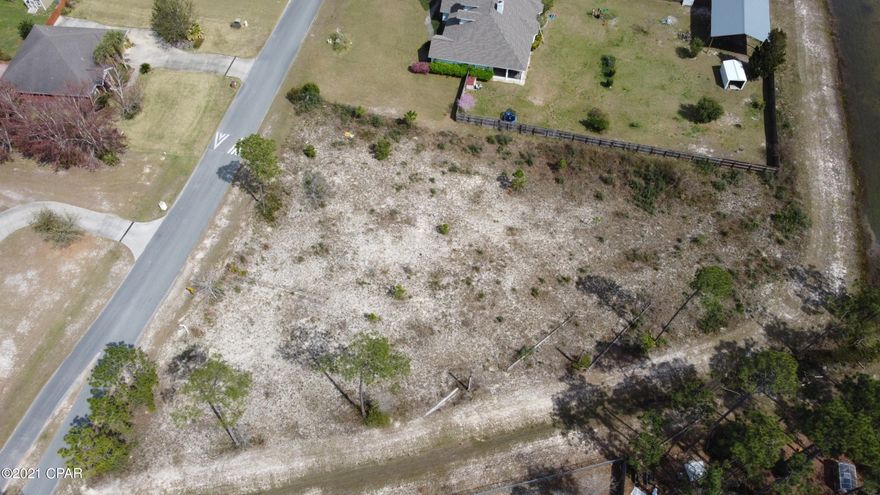 Searching for that perfect lot to spread out and build your dream home?  Check out this high and dry property on almost an acre in the White Oaks subdivision!   With only 8 miles to Lynn Haven, you're close enough to all the amenities of town yet far enough out to enjoy the piece and quiet that this beautiful neighborhood offers.  This property includes two parcel Ids:  07534-015-526 & 07534-015-320 totaling about .86 acres.  If measurements deemed important, please verify.