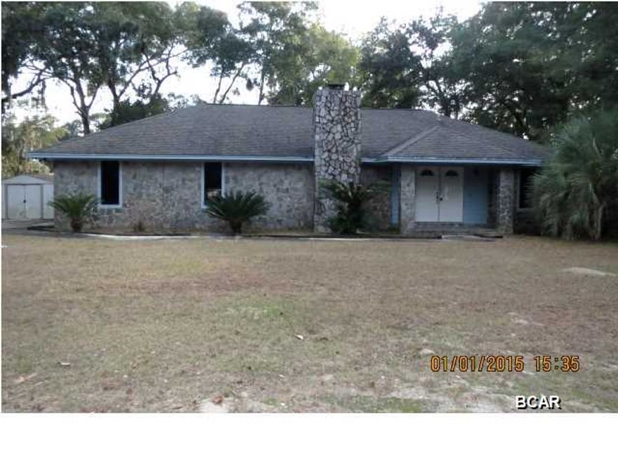 SPACIOUS FOUR-BEDROOM HOME that a formal living and dining room combination, large Family room with a fireplace and hardwood floors, a galley-style kitchen with updated appliances and three bedrooms and two full baths. The two-car garage was enclosed and could be a spacious fourth bedrooml, as it also has a full bath nearby, or it would make a great recreational room. Home sold in its AS IS condition.