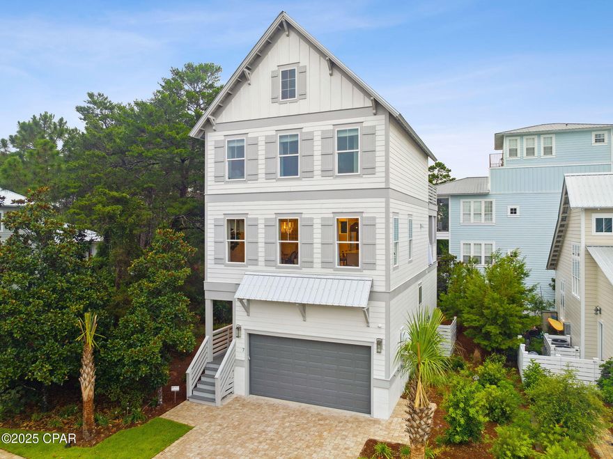 This turnkey 4-bedroom, 3.5-bath home is spread across three thoughtfully designed levels and comes fully furnished with stylish, tranquil décor. The open-concept layout is bathed in natural light, making it ideal for both everyday living and hosting vacation guests. The chef's kitchen features quartz countertops, stainless steel appliances, a gas cooktop, and flows effortlessly into the spacious dining and living areas.

Enjoy indoor-outdoor living with multiple decks on the second and third floorsperfect for entertaining or unwinding in the Gulf breeze.

As part of the Grande Pointe community, you'll have access to an amazing pool and clubhouse, while also being just steps away from kayaking, paddleboarding, and nature trails. This home presents an incredible rental opportunity with its unbeatable location, generous space, and resort-style amenities.

Don't miss your chance to own a piece of paradise whether as a primary residence, vacation home, or investment property.