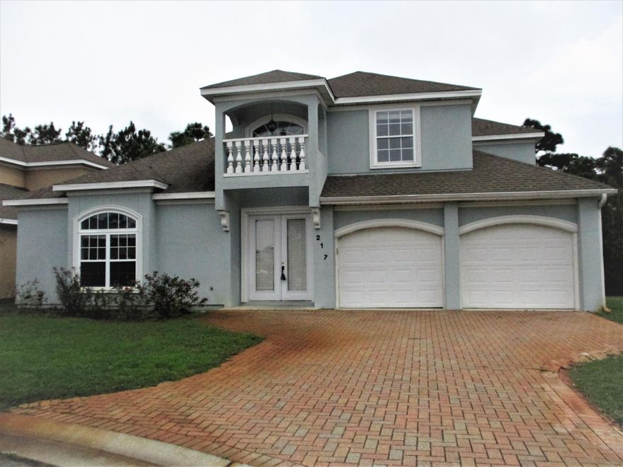 'CURRENTLY UNDER CONTRACT, SELLER ACCEPTING BACKUP OFFERS' Very nice POOL home in gated community on Panama City Beach! Close to everything. Convenient to shopping and dining. Just a few blocks to the Gulf of Mexico, within a Golf Course community. Priced to sell!  Located at the end of the cul-de-sac, this lovely 2 story home has a very nice lay out and featuers 3 bedrooms 2.5 baths, downstairs master with a huge closet and bathroom, double crown mouldings in the open living area, 10' ceilings, updated paint scheme, 2 additonal bedrooms upstains, loft could be used as an office or bonus room, does have a closet so it could be closed in for a 4th bedroom if needed.  Screened patio features a lovely in-ground pool. Basic landscaping makes this home an easy keeper! (all sizes approximate and buyer deems important)