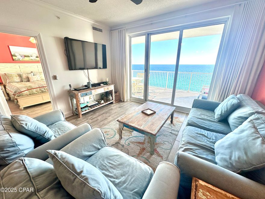 Offered for sale is Ocean Reef Unit 1505 -- a fully  furnished 2-bedroom, 2-bath Gulf-front condominium with an expansive 10x28 private balcony and breathtaking views of the Emerald Coast. From the moment you step inside, you're welcomed by stunning Gulf views visible from the entry, kitchen, dining, and living areas. The open-concept floor plan is designed for both comfort and entertaining, featuring elegant tile flooring, coastal décor, and abundant natural light throughout. The Gulf-front primary suite offers balcony access, spectacular water views, a king-size bed, and a private en-suite bath -- your own peaceful retreat by the sea. Step outside to the oversized balcony with ample space for dining, relaxing, and gathering. Enjoy waterfront meals, morning coffee at sunrise, or unwind in the evening while listening to the soothing sound of the waves while admiring the beautiful sunsets. The well-appointed, fully equiped, kitchen features granite countertops, updated lighting, and stainless-steel appliances. The dining area comfortably seats six, with additional seating at the breakfast bar. The living room offers plush furnishings and a 60'' wall-mounted TV with surround sound for the perfect movie night after a day at the beach. The spacious guest bedroom accommodates two queen beds and provides private access to the guest bath. A separate laundry room includes a new (2024) Whirlpool side-by-side washer and dryer, plus extra storage. There's even a dedicated workspace for remote work or Zoom meetings -- because paradise and productivity can coexist. It gets even better -- this unit includes an assigned, beachside covered parking space directly beneath the building. No searching for parking and no long walks across the street. Residents of Ocean Reef Resort enjoy over 300 feet of beachfront, a Gulf-front pool and hot tub, indoor pool, fitness center, and sauna. Ideally located just 1.5 miles from Pier Park -- home to premier shopping, dining, and entertainment -- and only one mile from Topgolf. Beachfront restaurants, coffee and doughnut shops, gift stores, mini-golf, go-carts, and more are all within a couple of blocks. Additional updates include a new A/C and water heater (2019).
All dimensions are approximate and should be verified by the buyer if important. This is Gulf-front living at its finest -- add Unit 1505 to your must-see list today. You'll be glad you did.