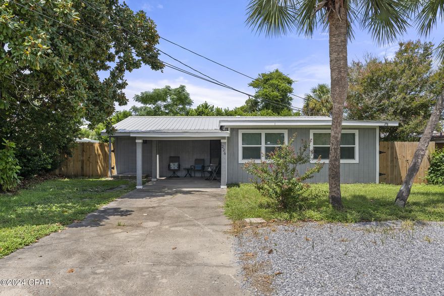 CURRENTLY UNDER CONTRACT, SELLER WILL CONSIDER BACKUP OFFERS
Welcome to 226 San Gabriel St, a charming single-family home nestled in the heart of Panama City Beach, FL. Built in 1960, this delightful residence offers a unique blend of character and modern convenience. With 1,313 sq. ft. of beautifully finished living space, it provides a cozy yet spacious environment perfect for comfortable living.

The home features two well-appointed bathrooms and a range of recent updates that make it feel like new. Enjoy the benefits of a new durable metal roof, fresh flooring throughout, and a stylishly updated kitchen. The kitchen boasts elegant quartz countertops, a new backsplash, a sleek new sink, and modern cabinets. For added convenience, the home includes USB charging outlets and a Nest thermostat.

The open and inviting layout includes a versatile Florida room, a convenient laundry room, and ample storage space. The property also offers a fenced-in backyard, ideal for outdoor relaxation and privacy, as well as a large parking area and a charming front door seating area where you can unwind.

This home is situated in a peaceful and secure neighborhood with a no short-term rental policy and no HOA, ensuring a tranquil living environment. The front door lock has been upgraded to enhance security, and the interior has been freshly painted to create a welcoming ambiance.

With its combination of timeless appeal and modern updates, 226 San Gabriel St is perfect for those seeking a quaint, well-maintained property in a highly desirable location. Walking distance to the World's most beautiful beach, Pier Park and the under Contruction attractions of Dolly's Pirate Voyage Dinner Show and Top Golf!  Don't miss out on the opportunity to make this your new home!